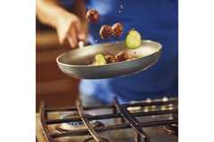 Image Chef cooking meatballs.